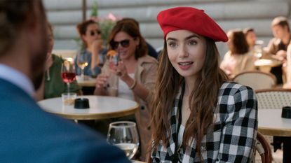 "Emily In Paris" (L To R) Lily Collins As Emily In Episode 103 Of "Emily In Paris". Credit: Netflix/The Hollywood Archive