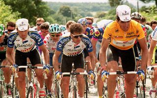 MONTLUON FRANCE JULY 22 Spains Miguel Indurain R the overall leader of the Tour de France is protected by his teammates Marino Alonso L and Pedro Delgado C from Italian Claudio Chiappucci 2nd L 22 July during the 17th stage of the race between La Bourboule and Montlucon JeanClaude Colotti of France won the stage and Indurain retained the yellow jersey Photo credit should read BORIS HORVAT FHAFP via Getty Images