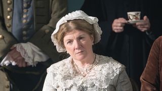 Felicity Montagu in a lacy bonnet as Aunt Bridget in Tom Jones.