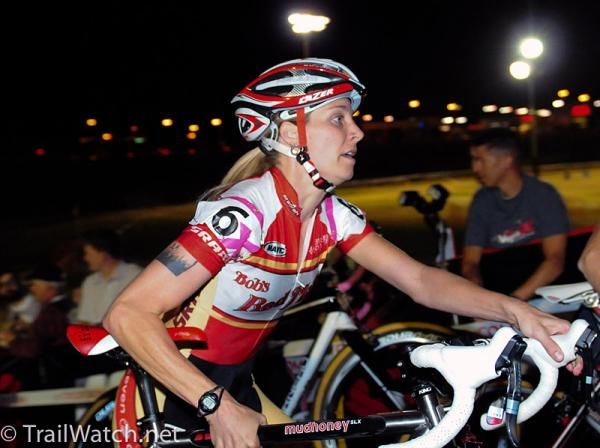 Mo Bruno-Roy (Bob's Red Mill - Seven) running with her bike.
