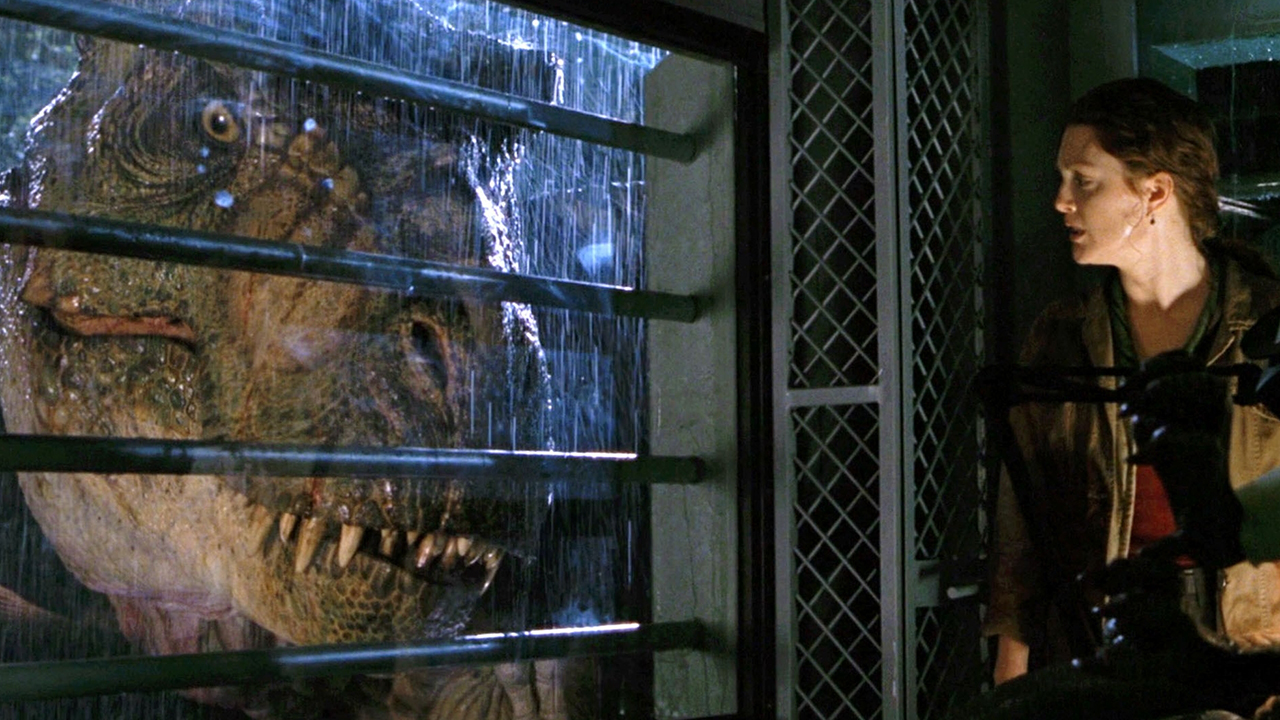 A frame from the movie Forsaken World: Jurassic Park.  Here we see a T-Rex peering through a barred window while a woman hides inside.