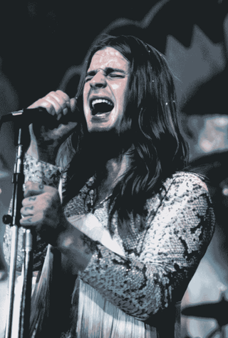 Ozzy Osbourne singing onstage