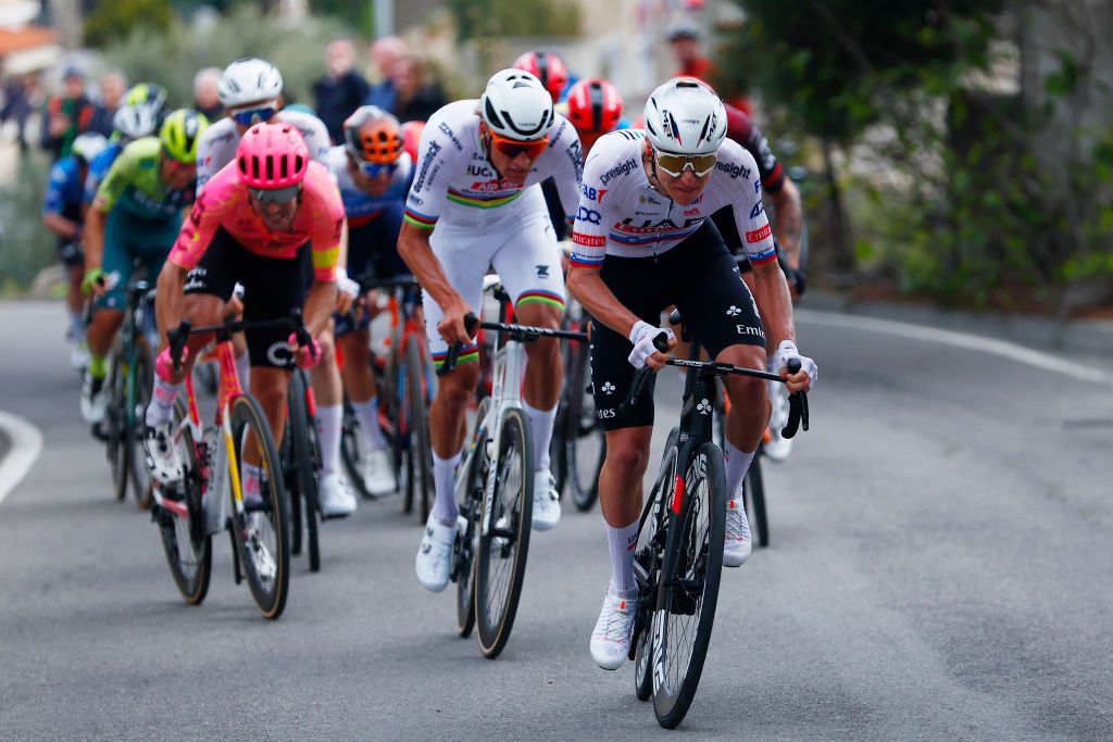 Tadej Pogačar attacking at Milano-Sanremo with Mathieu van der Poel in his wheel