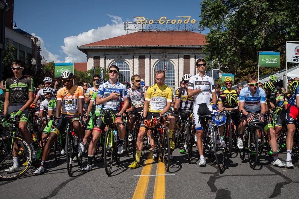 Riders on the start line in front of the Rio Grande train station.