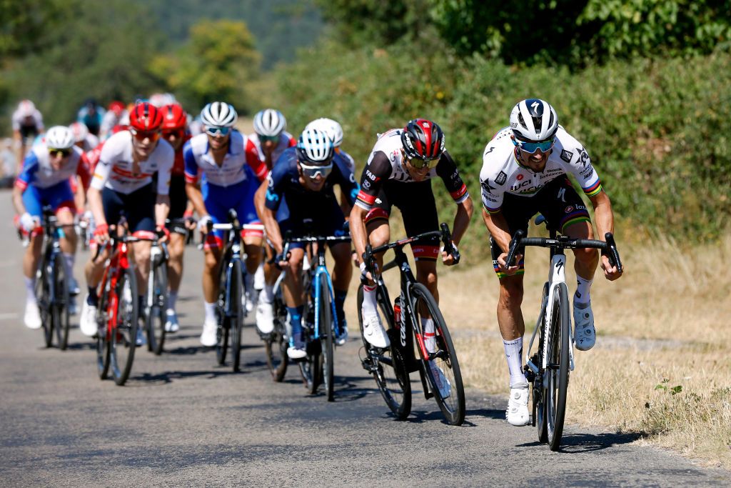 VALREVERMONT FRANCE AUGUST 09 Julian Alaphilippe of France and Team QuickStep Alpha Vinyl attacks in the chase group during the 34th Tour de lAin 2022 Stage 1 a 152km stage from ChtillonSurChalaronne to ValRevermont TDA22 on August 09 2022 in ValRevermont France Photo by Bas CzerwinskiGetty Images