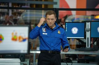 Carry-On on Netflix stars Taron Egerton as a blackmailed airport worker Ethan Kopek (see first look above).