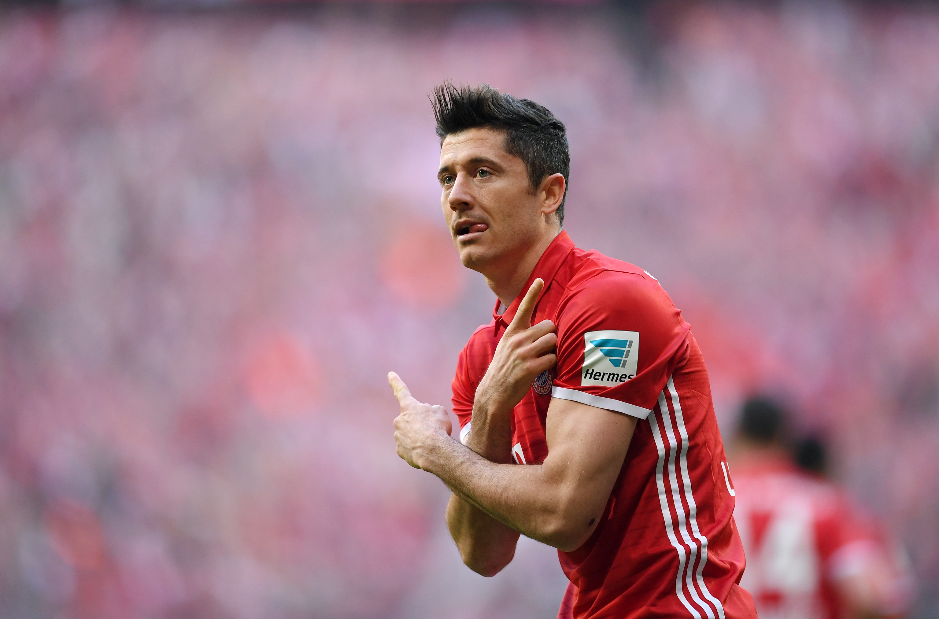 Robert Lewandowski celebrates a goal for Bayern Munich against Borussia Dortmund in April 2017.