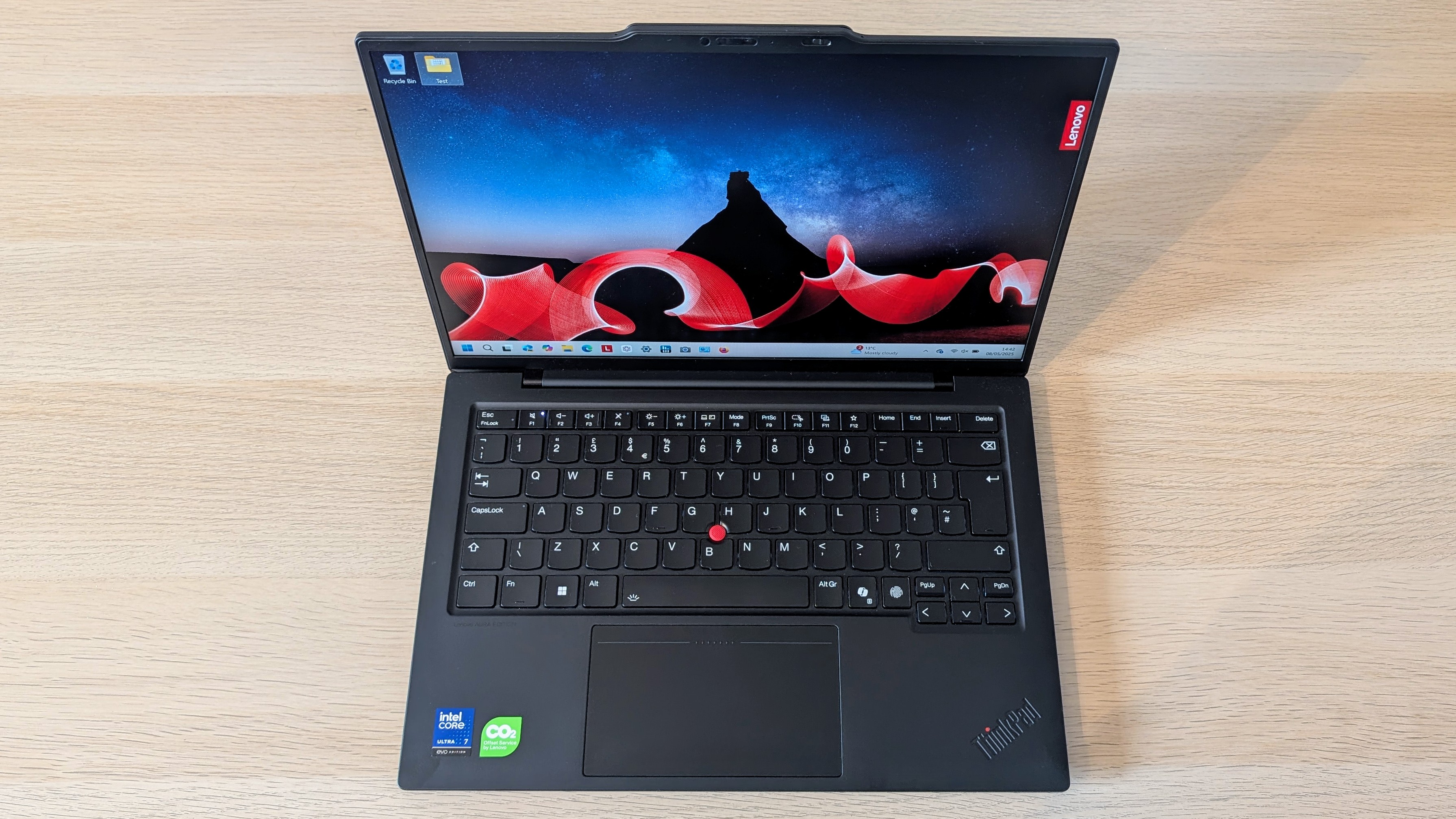 The Lenovo ThinkPad X1 Carbon Gen 13 on a desk