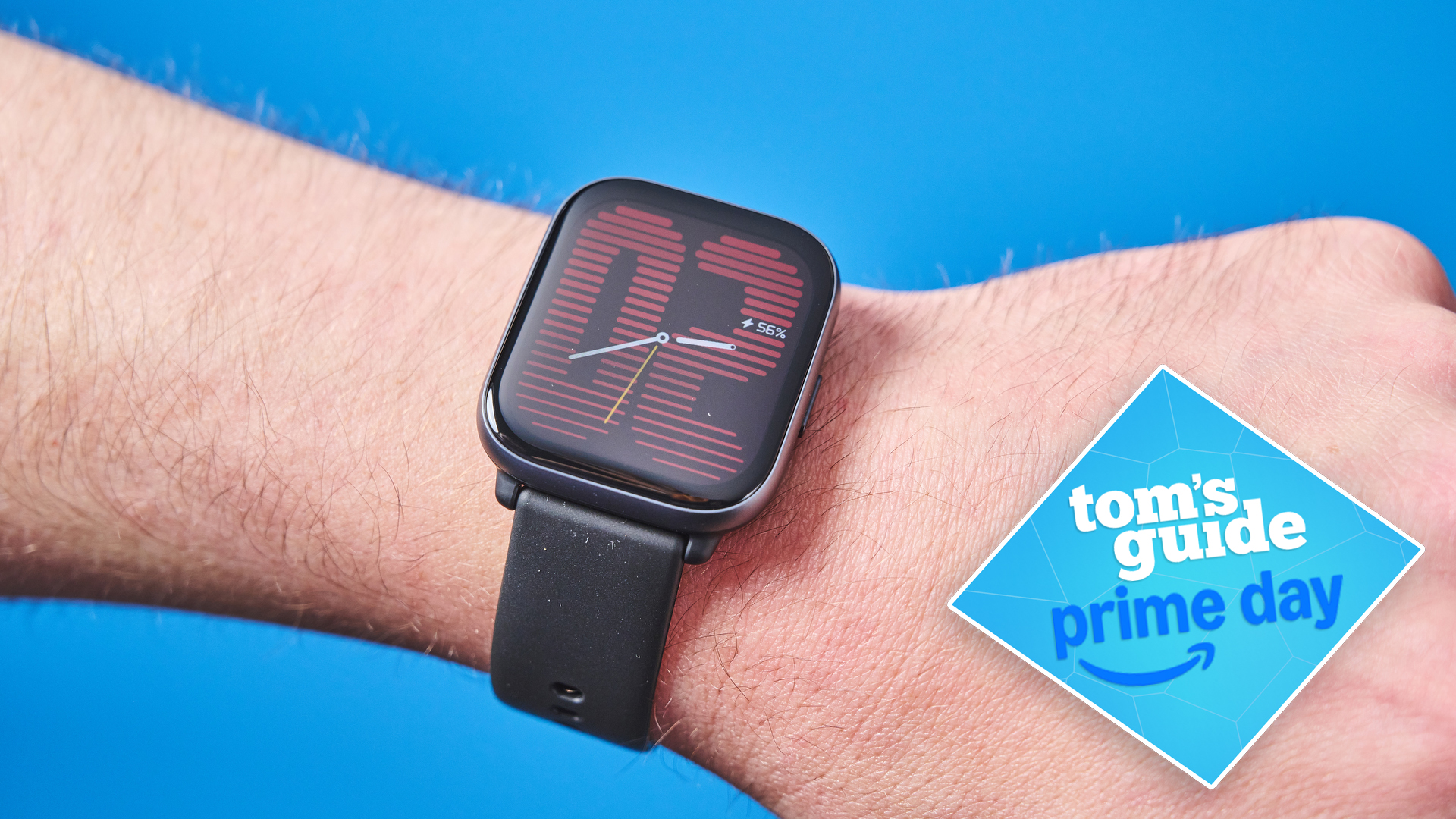 The Amazfit Active on a person&#039;s wrist. A blue Tom&#039;s Guide Prime Day deals tag is in the bottom right-hand corner of the image.