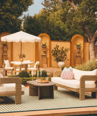 italian inspired patio styled for the lulu and georgia summer 2025 outdoor collection