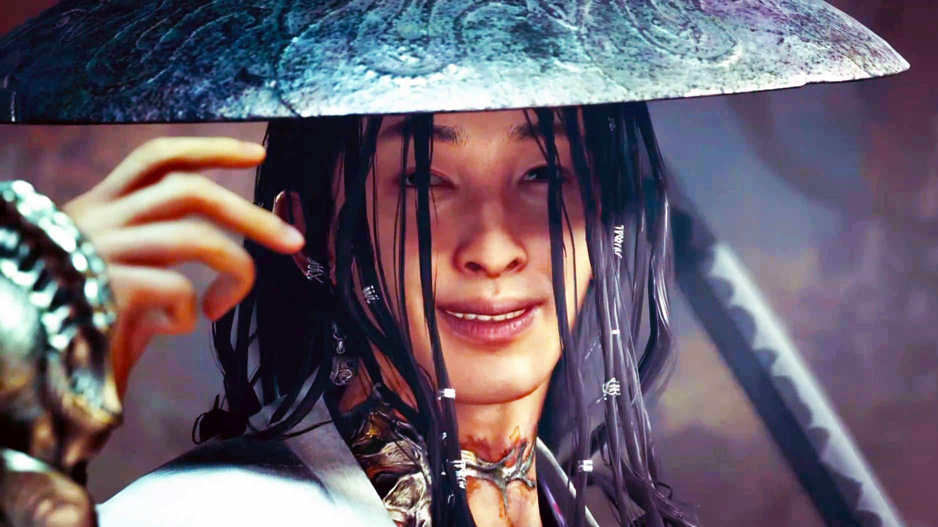 Onimusha: Way of the Sword's villain, Sasaki Ganryu, grinning at the viewer while preparing to have a sword fight.