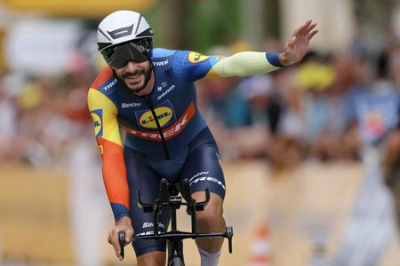 Julien Bernard waving to the crowds at the Tour de France