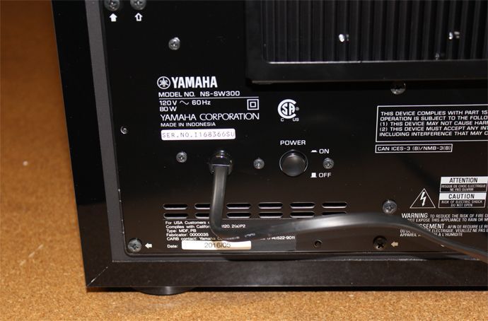 The power cord is permanently attached to the Yamaha SW300&rsquo;s back panel.