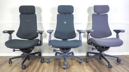 The LiberNovo Omni, Omni SE and Omni Pro office chairs next to each other against a wall