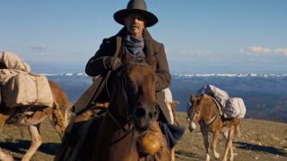 Kevin Costner sitting on horseback in Horizon: An American Saga.
