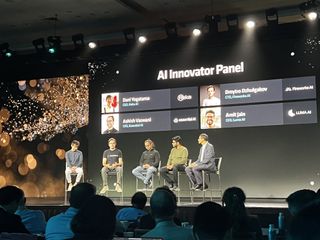 Panel discussion on stage at AMD Advancing AI conference in San Francisco, California.