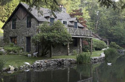 Cottage house on edge of lake