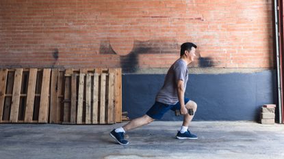 Man completing a dumbbell workout