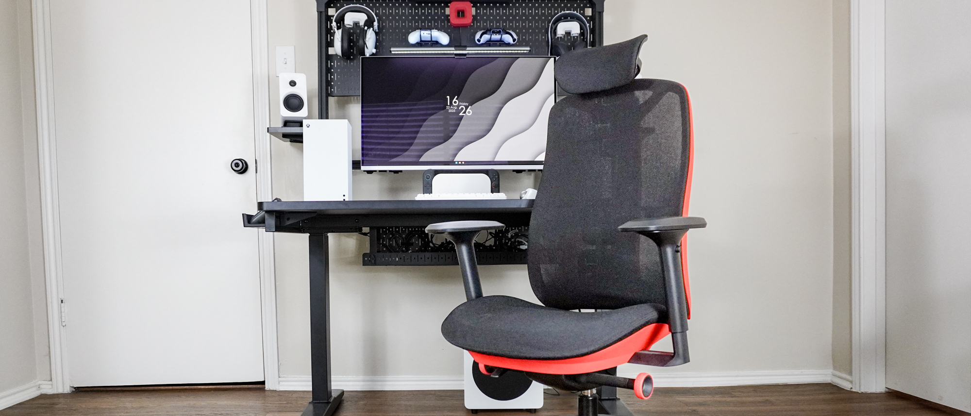 The Herman Miller Vantum Gaming Chair in front of the Corsair Platform 4: Elevate standing desk