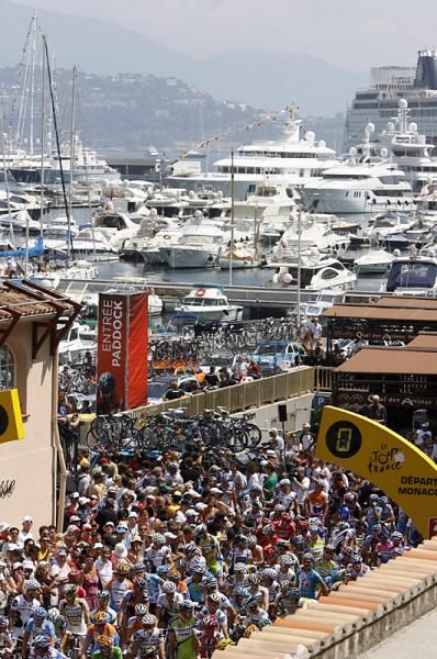 The peloton prepares to start stage two on the Monaco waterfront.