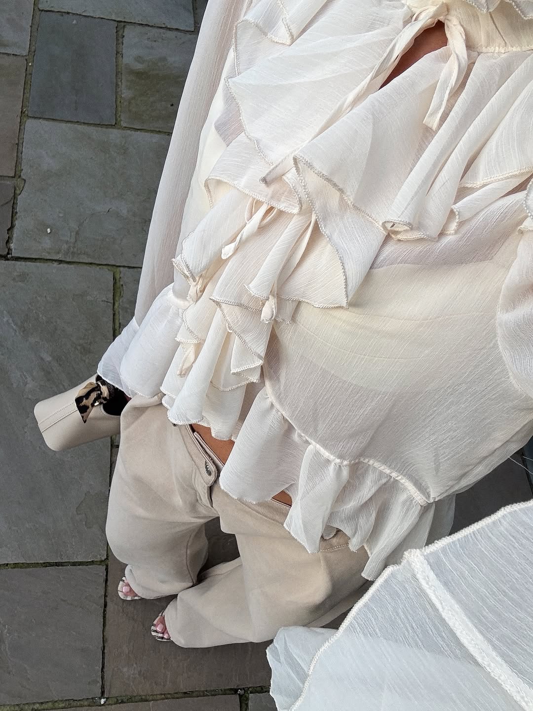 An image of a woman wearing timeless summer outfit