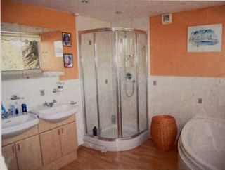 before shot of an orange bathroom