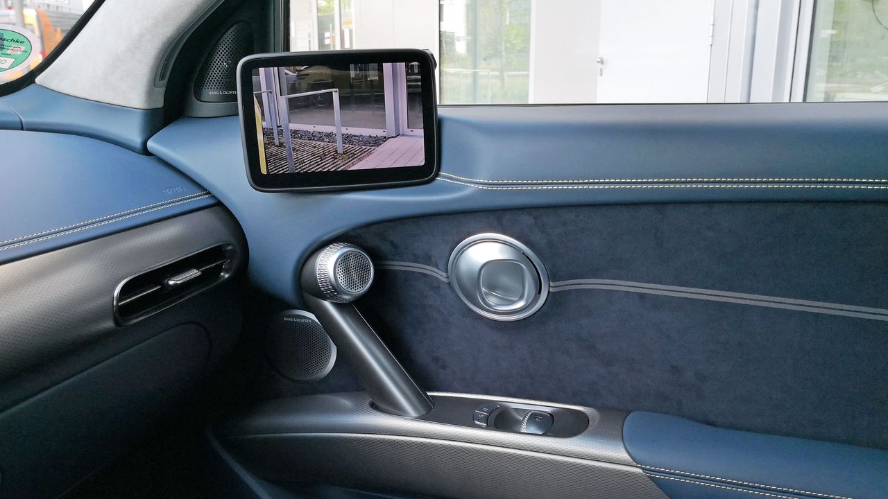 View of digital side mirror display mounted on passenger side door