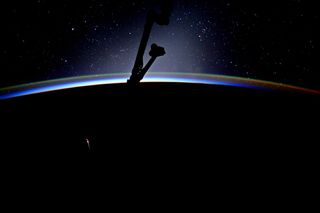 A Dragon cargo vehicle streaks through Earth's atmosphere after leaving the space station on July 3. NASA astronaut Jack Fisher tweeted this photo with the caption: "Beautiful expanse of stars-but the 'long' orange one is SpaceX-11 reentering! Congrats team for a successful splashdown & great mission!"