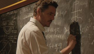 Pedro Pascal as Reed Richards write math on a chalkboard
