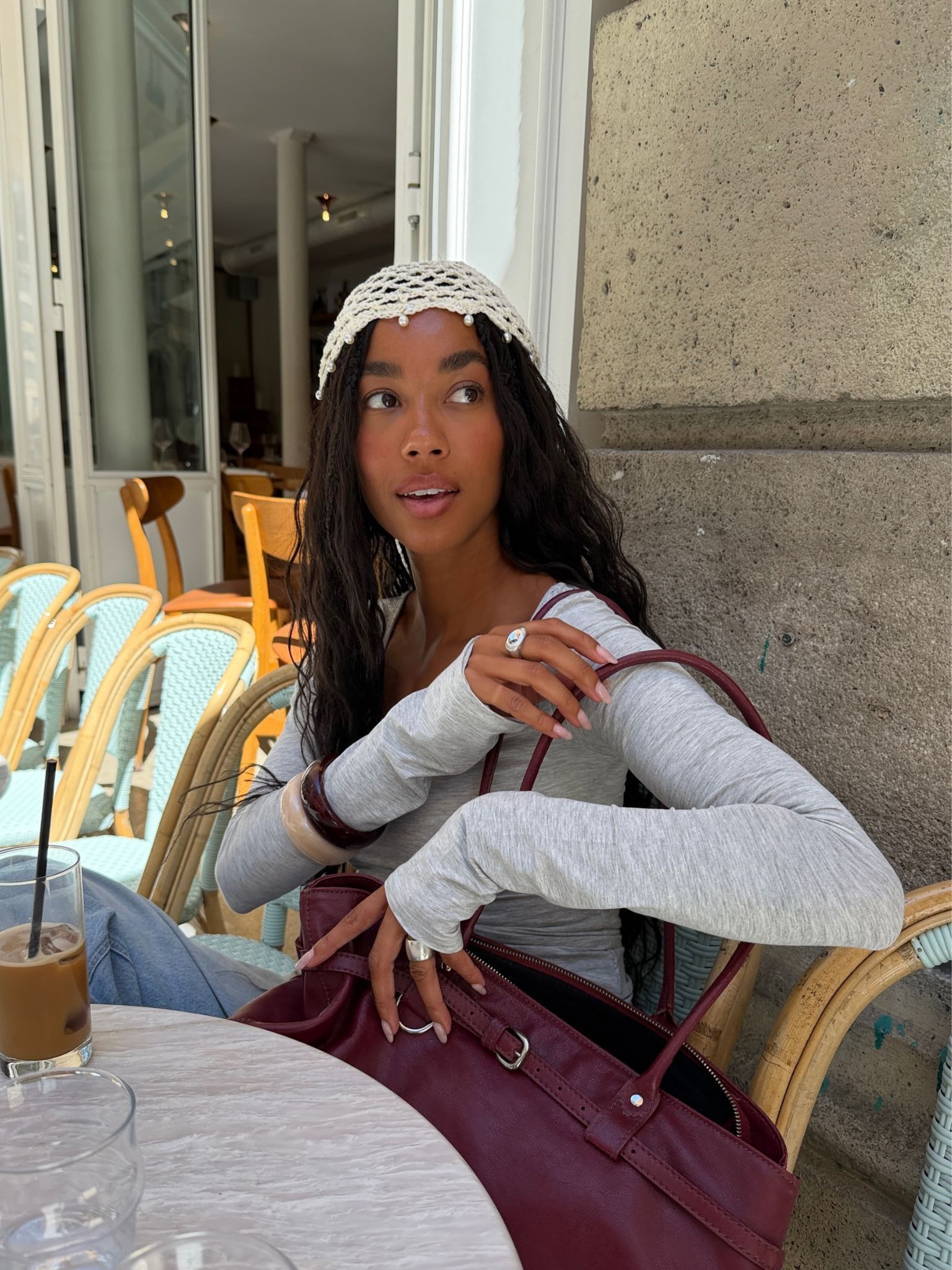 A woman wearing a crochet hair accessory