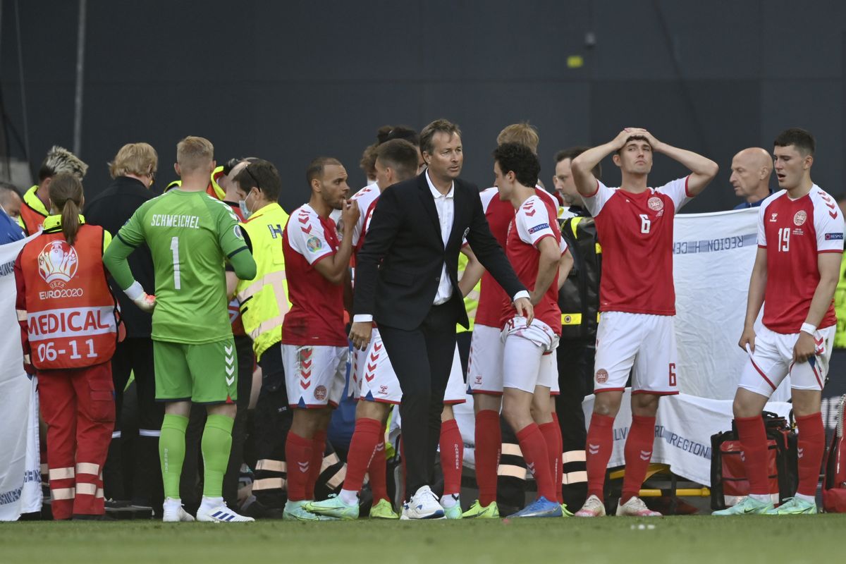 Kasper Hjulmand, centre, feels his players were not treated with “compassion” by UEFA following Christian Eriksen’s cardiac arrest