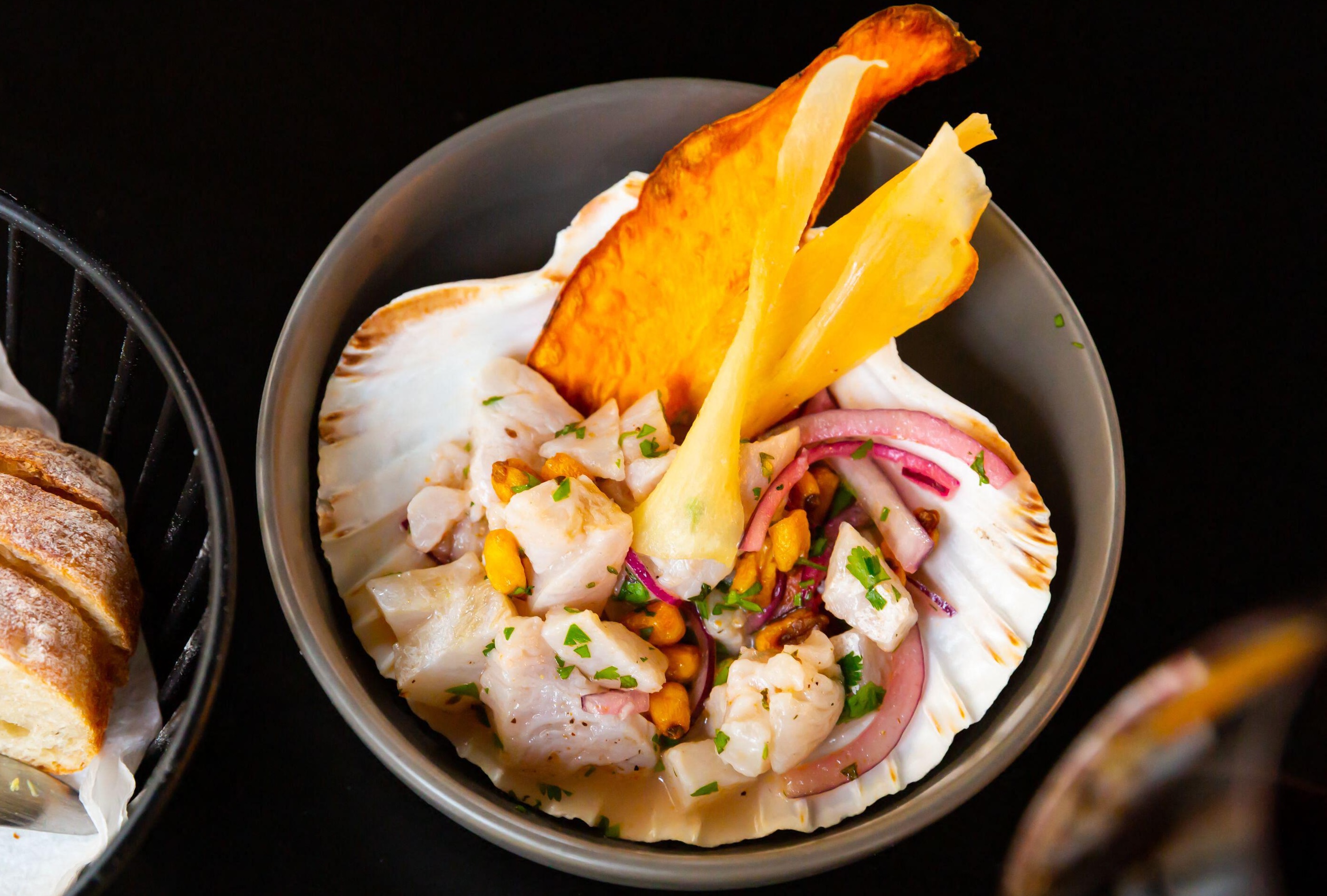 Seafood ceviche, typical dish from Peru, served in a shell
