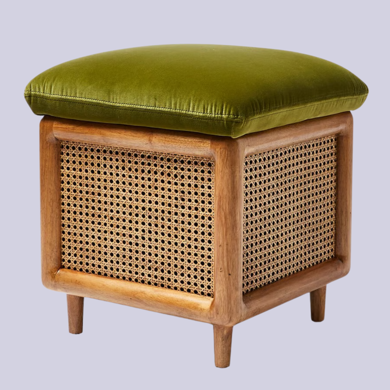 A rattan storage stool with a green velvet cushion top