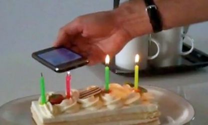 The iPhone "Blower" app allows you to blow out birthday candles - without ever taking a breath