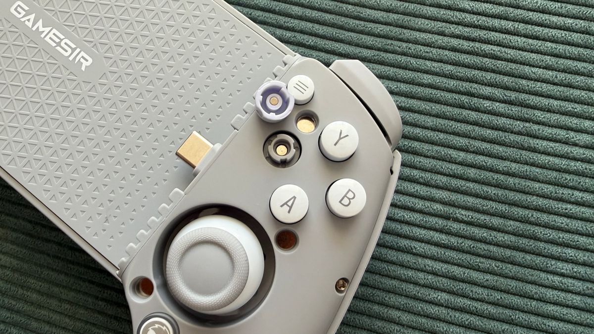 The GameSir G8+ MFi mobile controller on a green surface