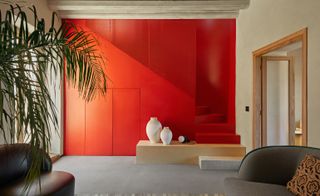 orange doors interior in restored house in Sicily, part of Airbnb rent-free scheme