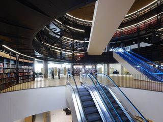 Interior of Birmingham Library with overlapping rotundas and escalators