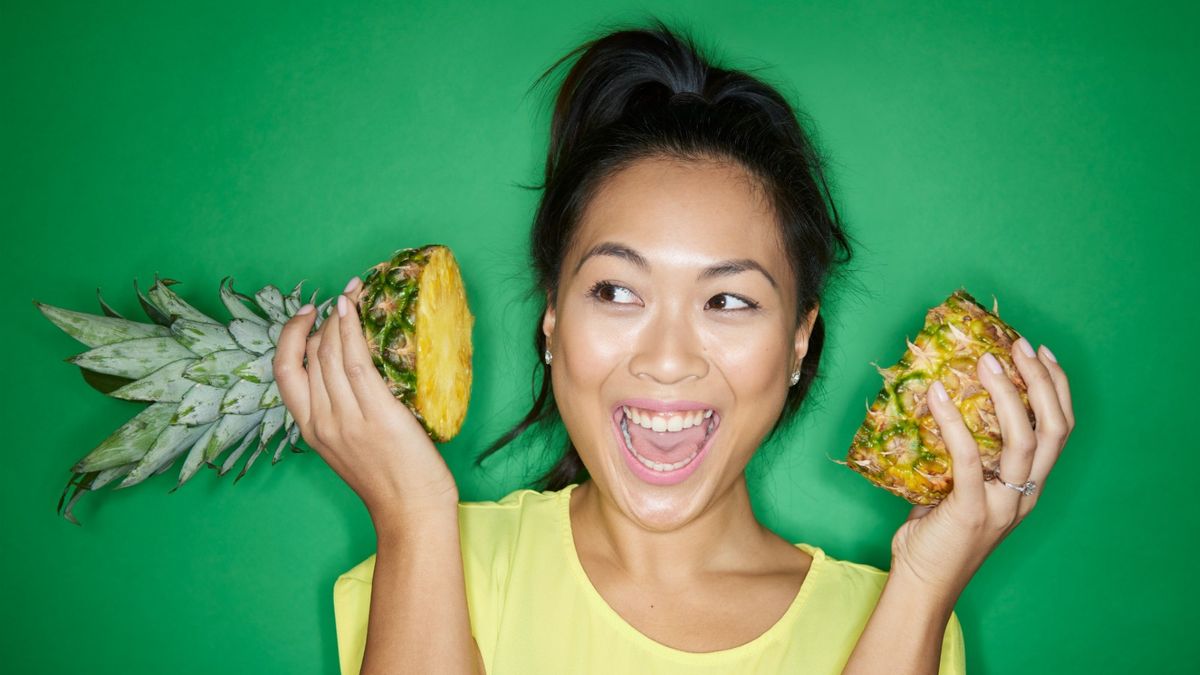 Woman with pineapple