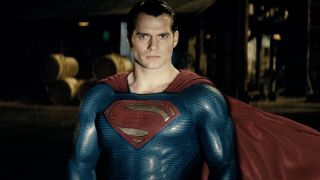 Henry Cavill's Superman illuminated by Batmobile headlights