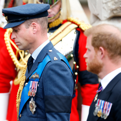 Prince William, Prince of Wales and Prince Harry, Duke of Sussex attend the Committal Service for Queen Elizabeth II at St George's Chapel, Windsor Castle on September 19, 2022 in Windsor, England.