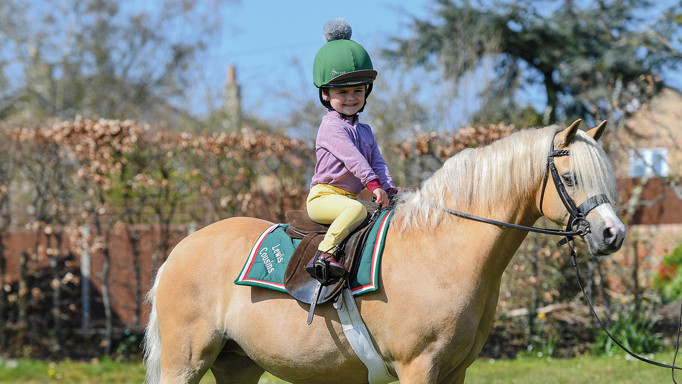 Lewis Cousins riding Cosford Wishful Thoughts (Honey) at Christina and Kevin Gillett yard, in the village of Little Downham near Ely in Cambridgeshire in the UK on the 19th April 2021