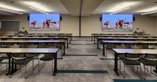 A dvLED Daktronics display brightens up an empty training room.