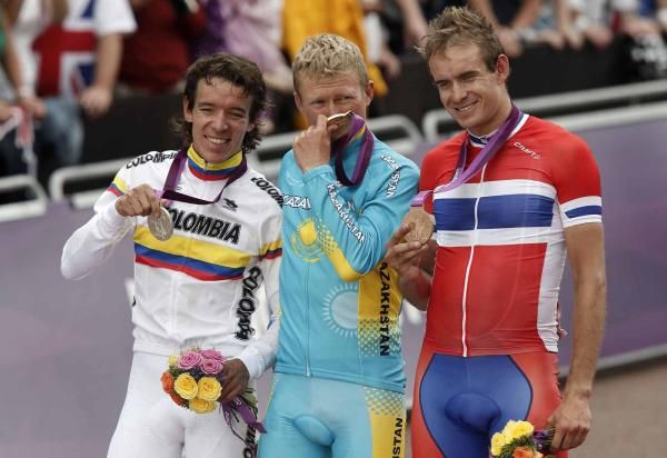 Rigoberto Uran (Colombia), Alexandre Vinokourov (Kazakhstan) and Alexander Kristoff (Norway) on the podium.