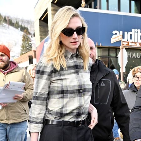 Elizabeth Debicki attends the 2026 Sundance Film Festival wearing Dr. Martens chelsea boots and a plaid shirt