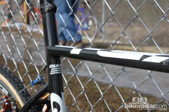 The Giant TCX Advanced SL has a top tube shapped to take (some) of the pain out of sholdering a bike