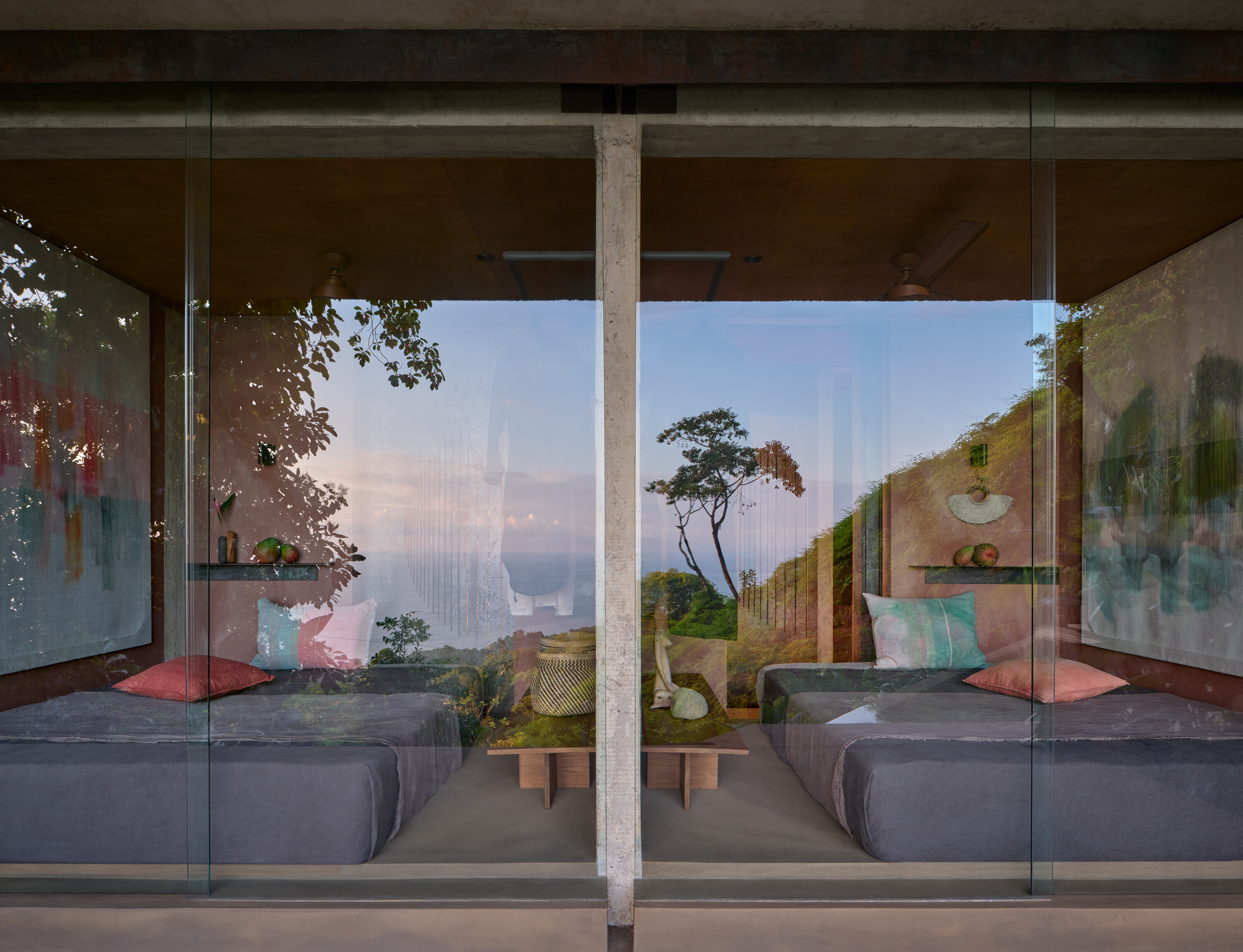 The two bedrooms are identical, with Studio Geometr wall-hangings