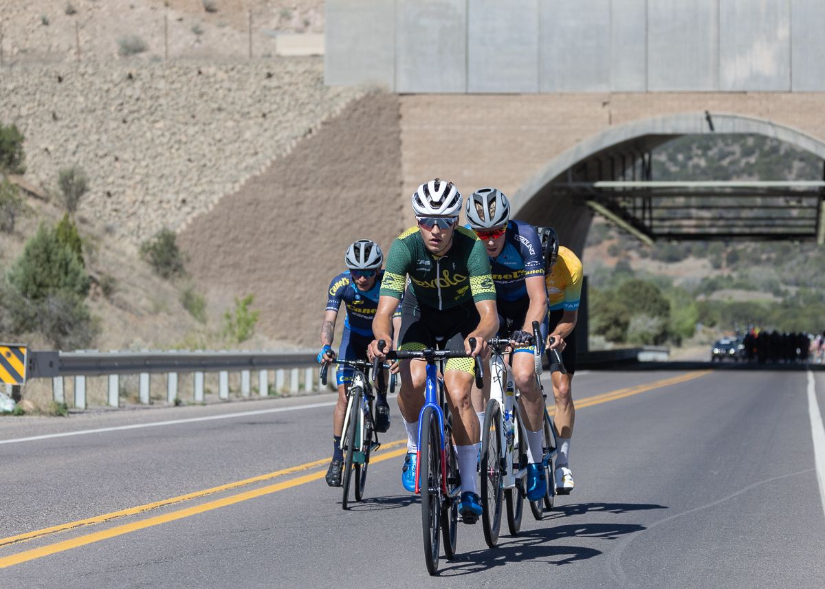 Alexander White (Aevolo Cycling) leads a group of four riders tryint to bridge across to the lead group of 5 at mile 13