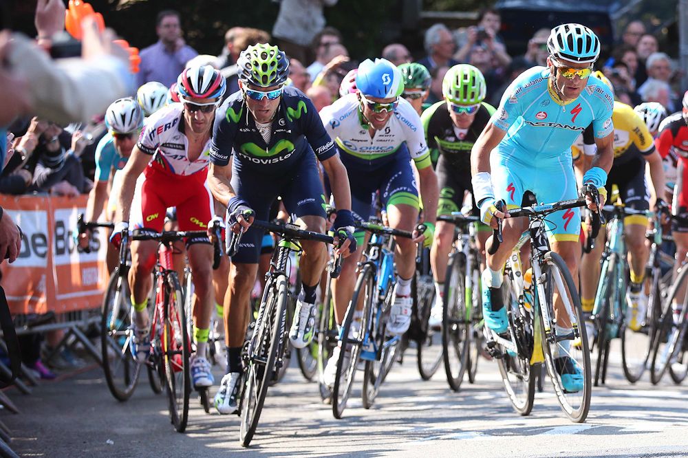 Alejandro Valverde (Movistar), Michele Scarponi (Astana), Daniel Moreno (Katusha) and Michael Albasani (Oric-GreenEdge) approach the finish on Mur de Huy.