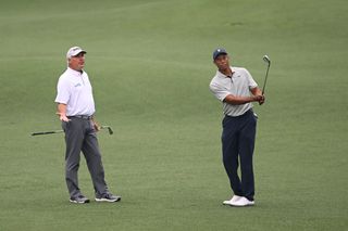 Fred Couples and Tiger Woods during a practice round at the 2023 Masters
