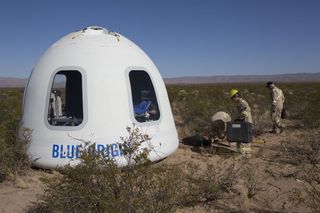 Blue Origin's Mannequin Skywalker test dummy can be seen inside the company's upgraded New Shepard crew capsule through the largest windows ever built for a spacecraft. The dummy was one of 12 payloads on a maiden test flight of the New Shepard Crew Capsule 2.0 in West Texas on Dec. 12, 2017.